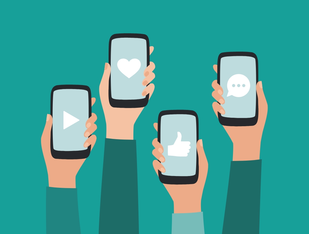 Graphic showing four hands, each holding a mobile phone displaying a different social media icon