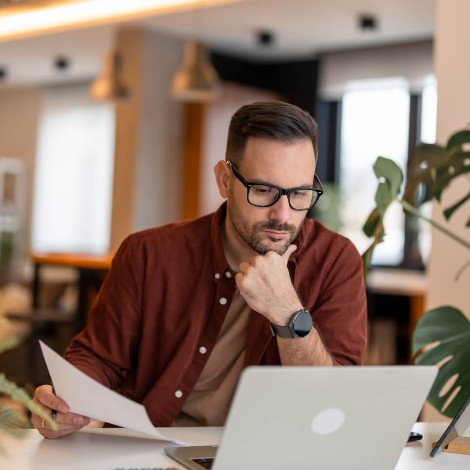 Image showing a writer working in front of a laptop