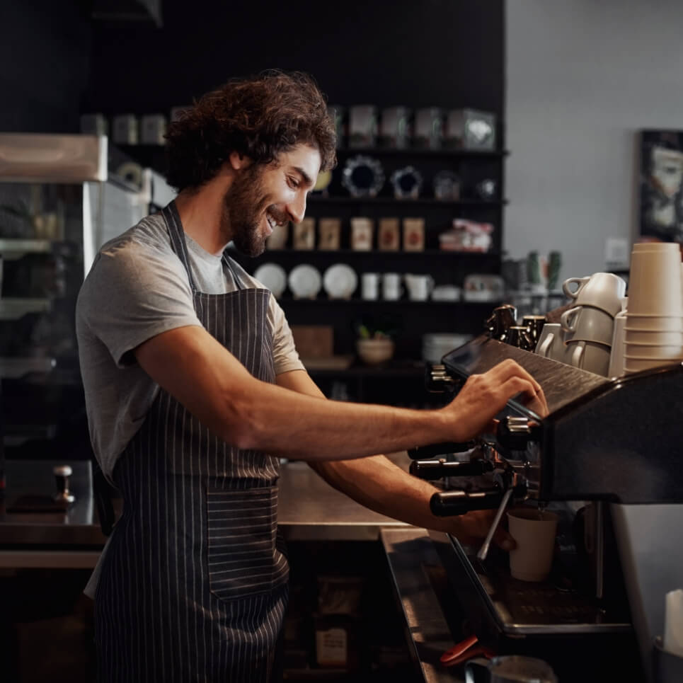 Image showing a barrista using a coffee machine