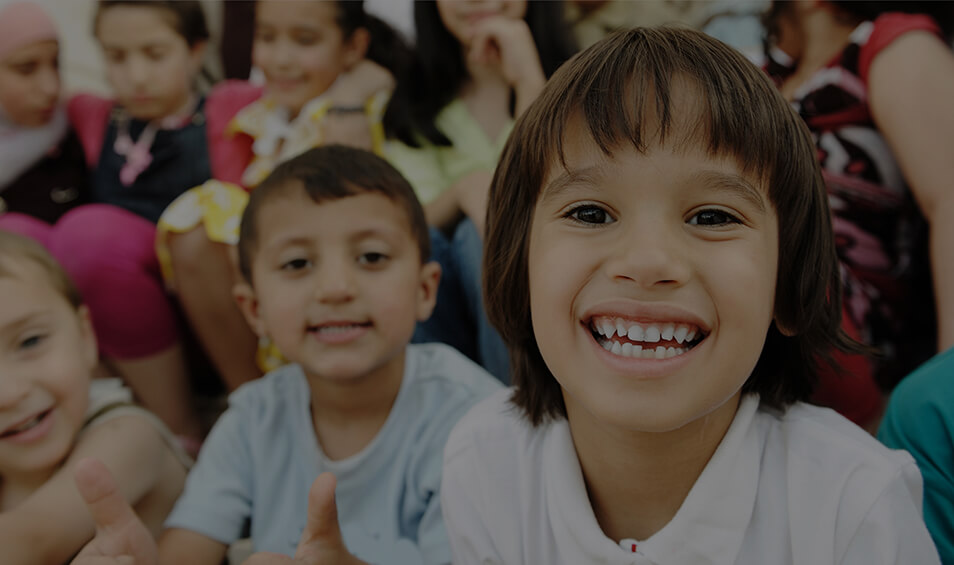 Image showing children sitting and smiling at the camera