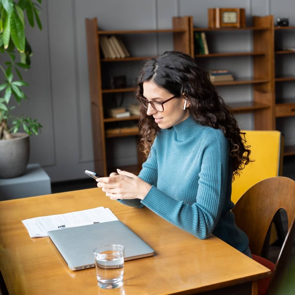 Image showing a woman using her phone