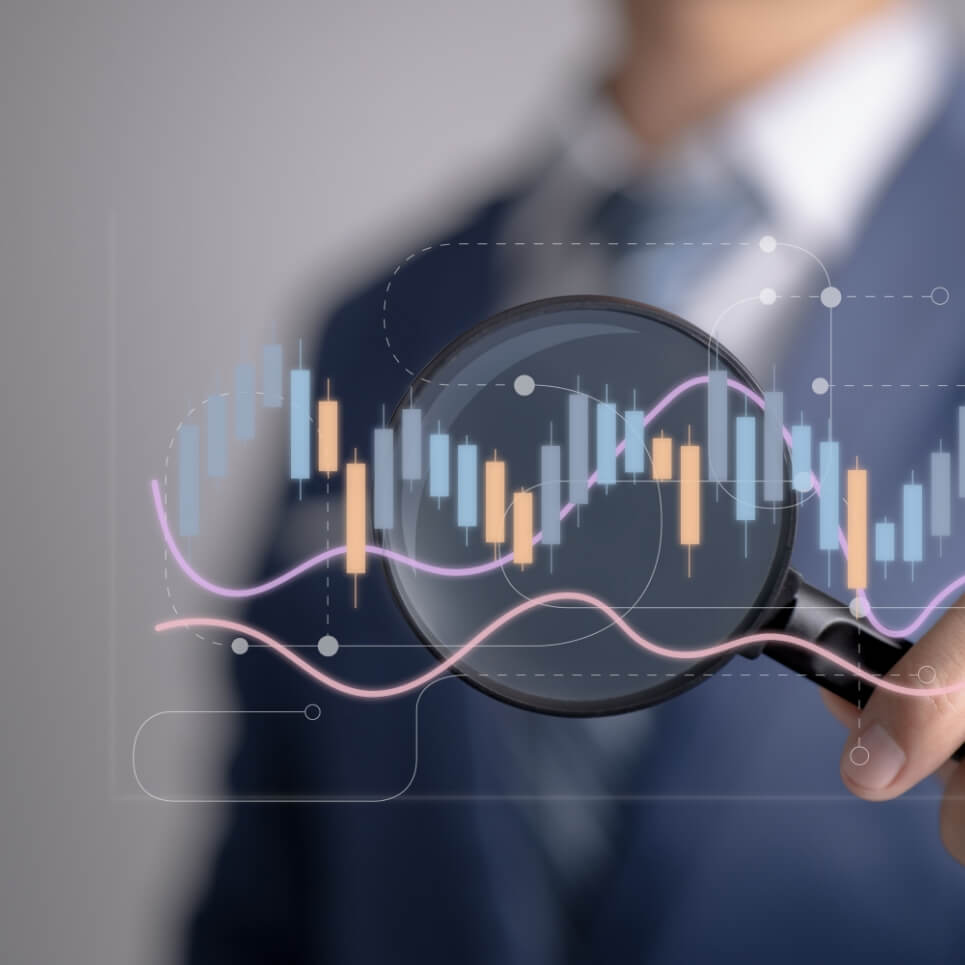 Image showing a man pointing a magnifying glass to a graph