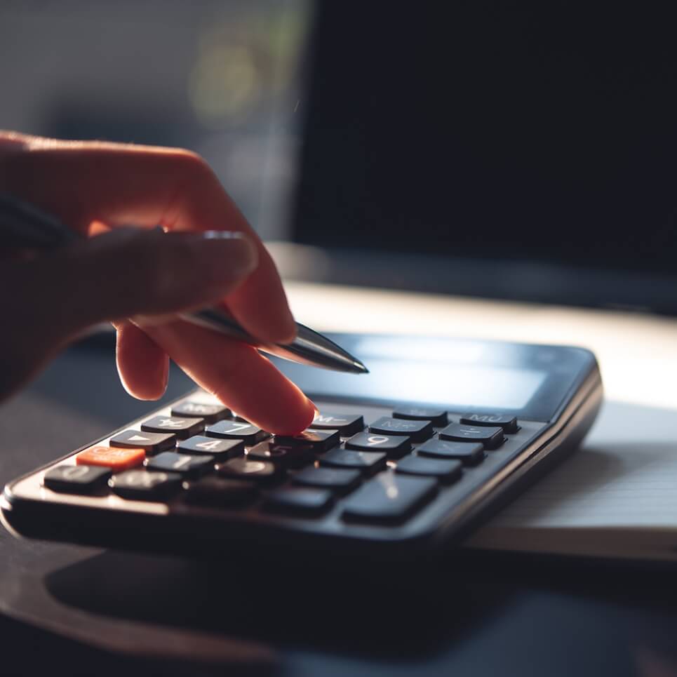 Image showing a close up of someone using a calculator